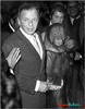 Photo of Ol' Blue Eyes, Frank Sinatra with a chimpanzee