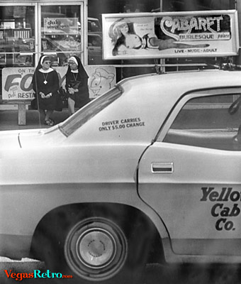 Photo of Nuns and a sexy stripper cab sign