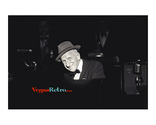 Photo of Jimmy Durante playing piano on Las Vegas stage in 1968