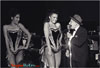 Photo of Jimmy Durante and showgirls on the Las Vegas stage