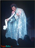 Liberace communes with his audience on Vegas stage