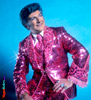 Portrait of Liberace in pink suit 