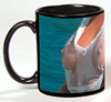 Photo of breasts in wet t-shirt on a black coffee mug