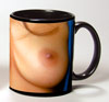 Photo of Yvette Lopez bare breasts reproduced on a black coffee cup