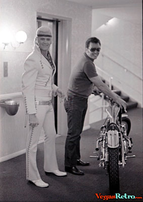 Photo of Wayne Cochran with special made Harley Davidson motorcycle