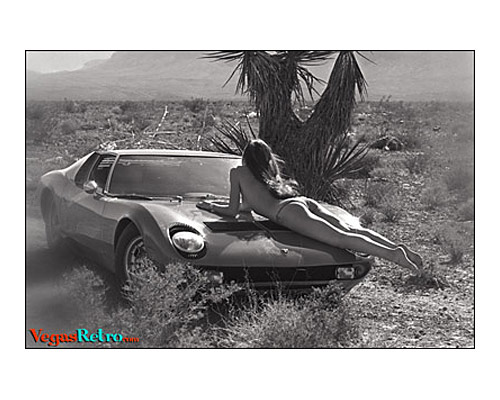 Image of topless girl on a Lamborgini