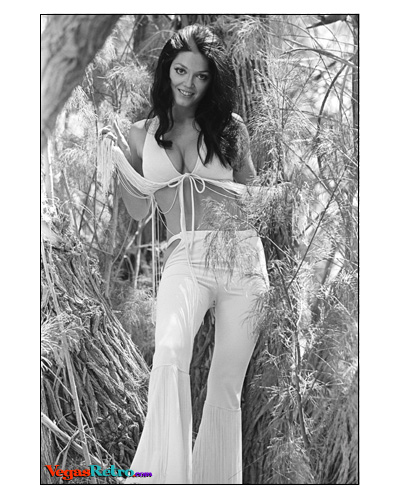 AND SHE SINGS, TOO - 22 year old French-Canadian, Diane Eddington, popular model and oft-times hostess for Sahara Hotel special events.  Diane hits the tape at a very photogenic 36-21-35, all very well placed.  Her lovely voice is heard nightly on stage with Murray Arnold at the Desert Inn Lounge.